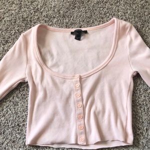 Pink long sleeve, deep necked cropped shirt. Very breathable and comfy to wear!